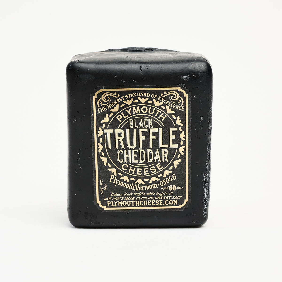 Plymouth Cheese Truffle Cheddar on a white background at Addison West