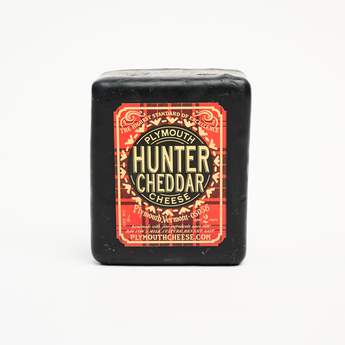 Plymouth Cheese Hunter Cheddar on a white background at Addison West