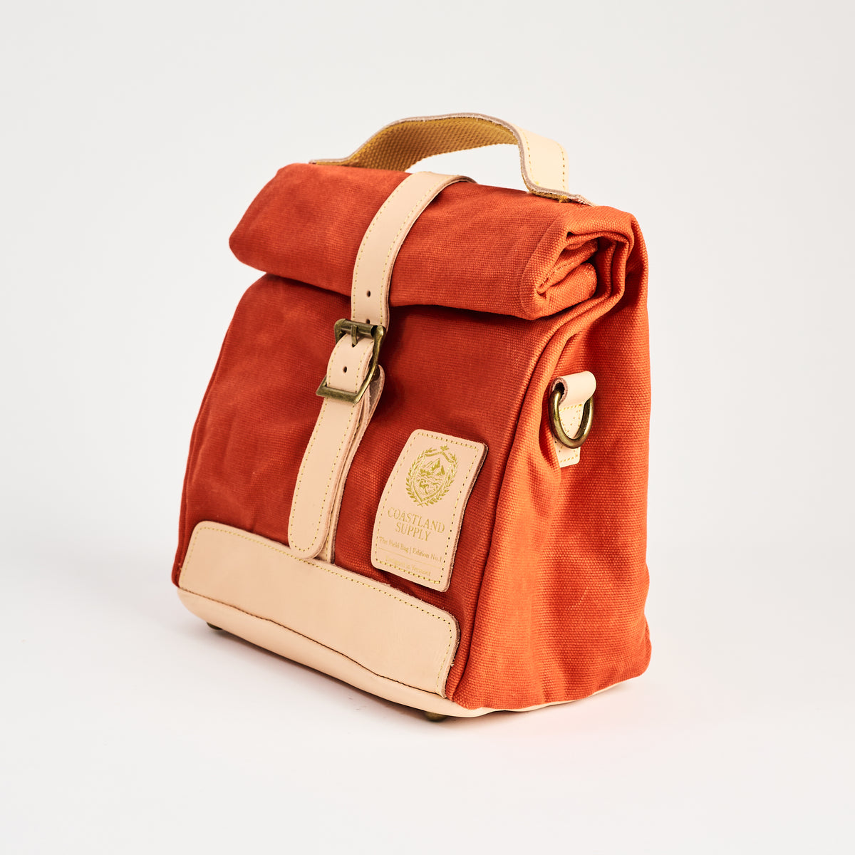 Insulated Field Bag in Hunter Orange on a white background at Addison West