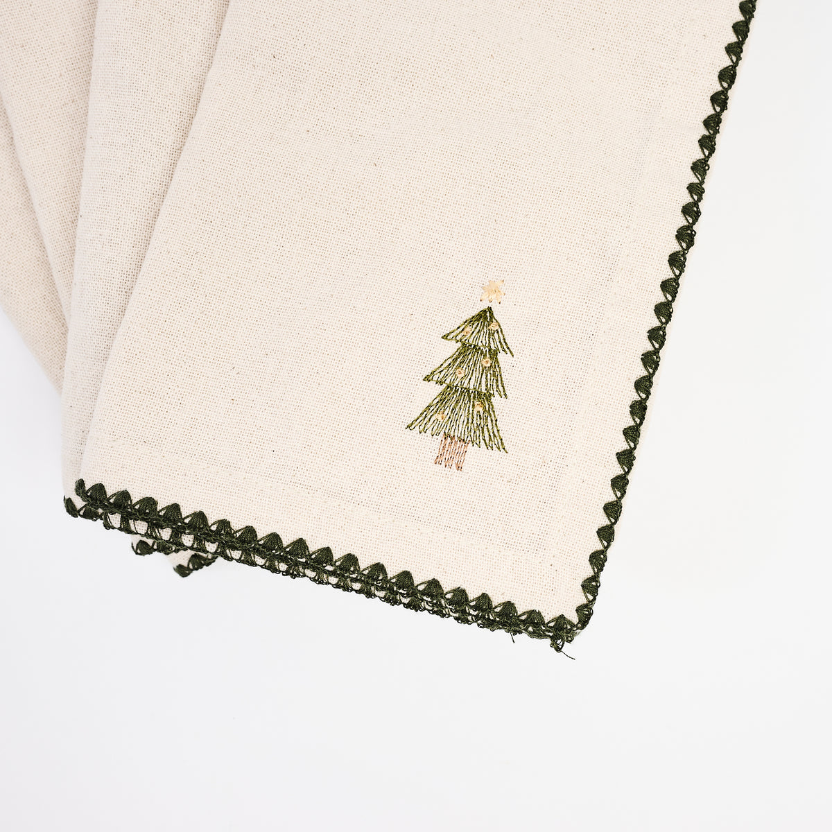 Festive Tree Embroidered Napkins, Set of 4 in a white background at Addison West