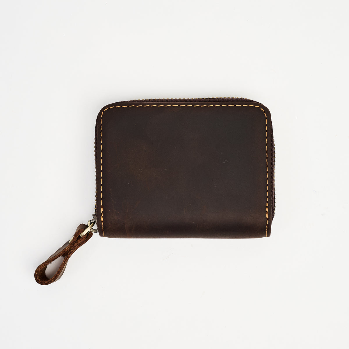 Zippered Small Leather Wallet in Dark Brown on a white background at Addison West