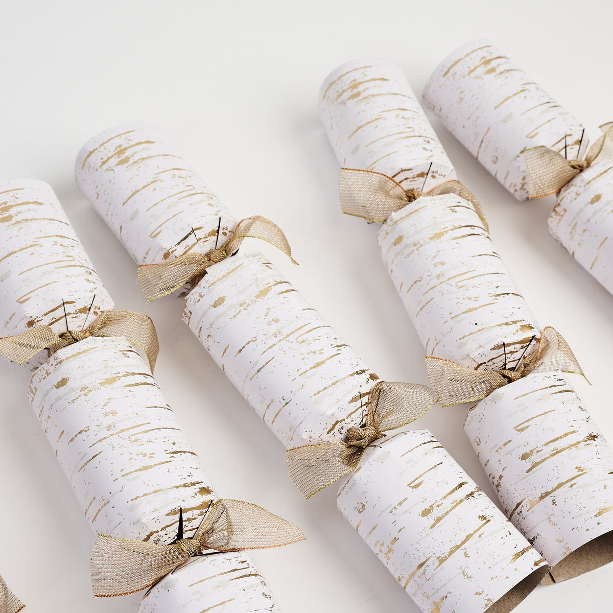 Gold Birch Christmas Crackers on a white background at Addison West