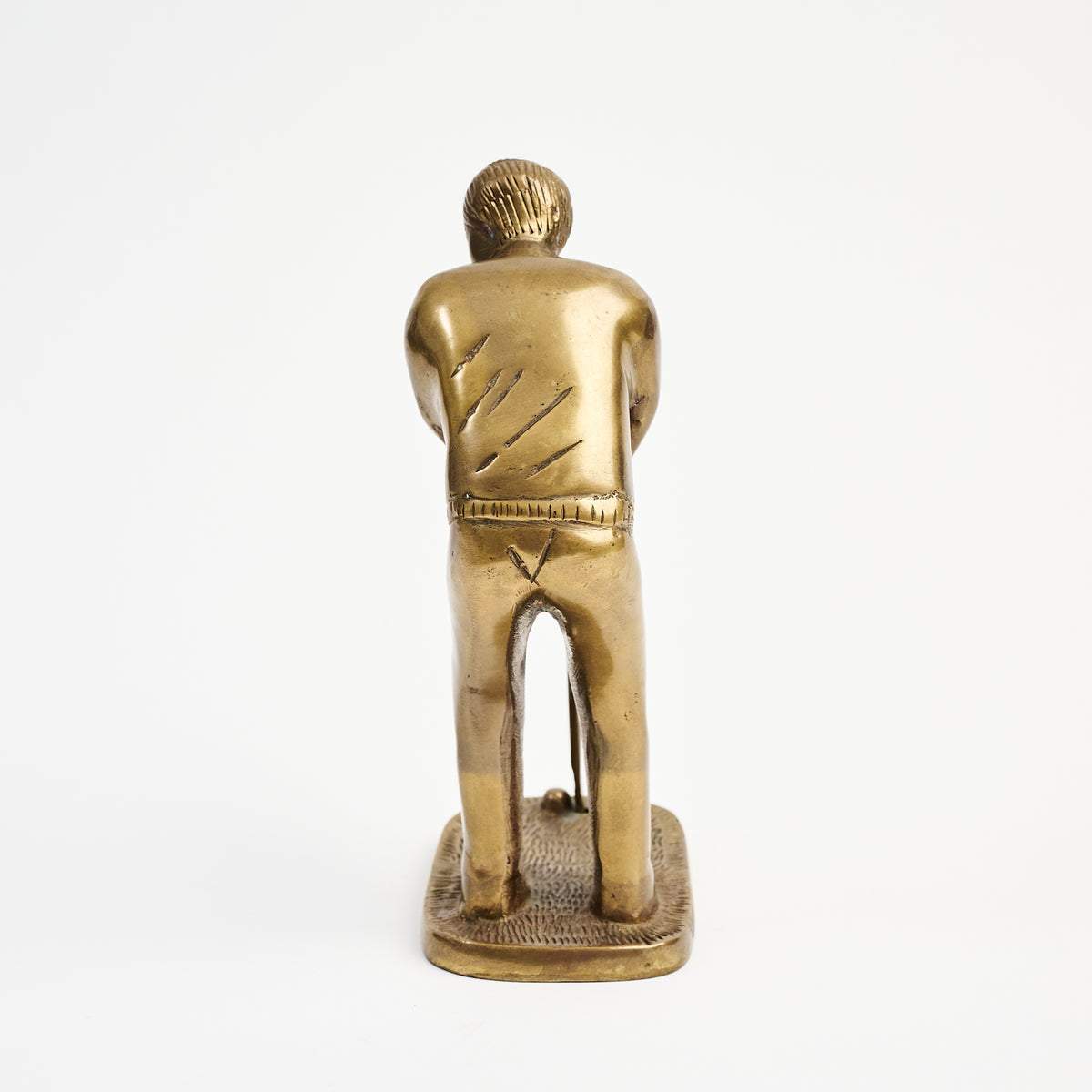 Vintage Brass Golfer on a white background at Addison West