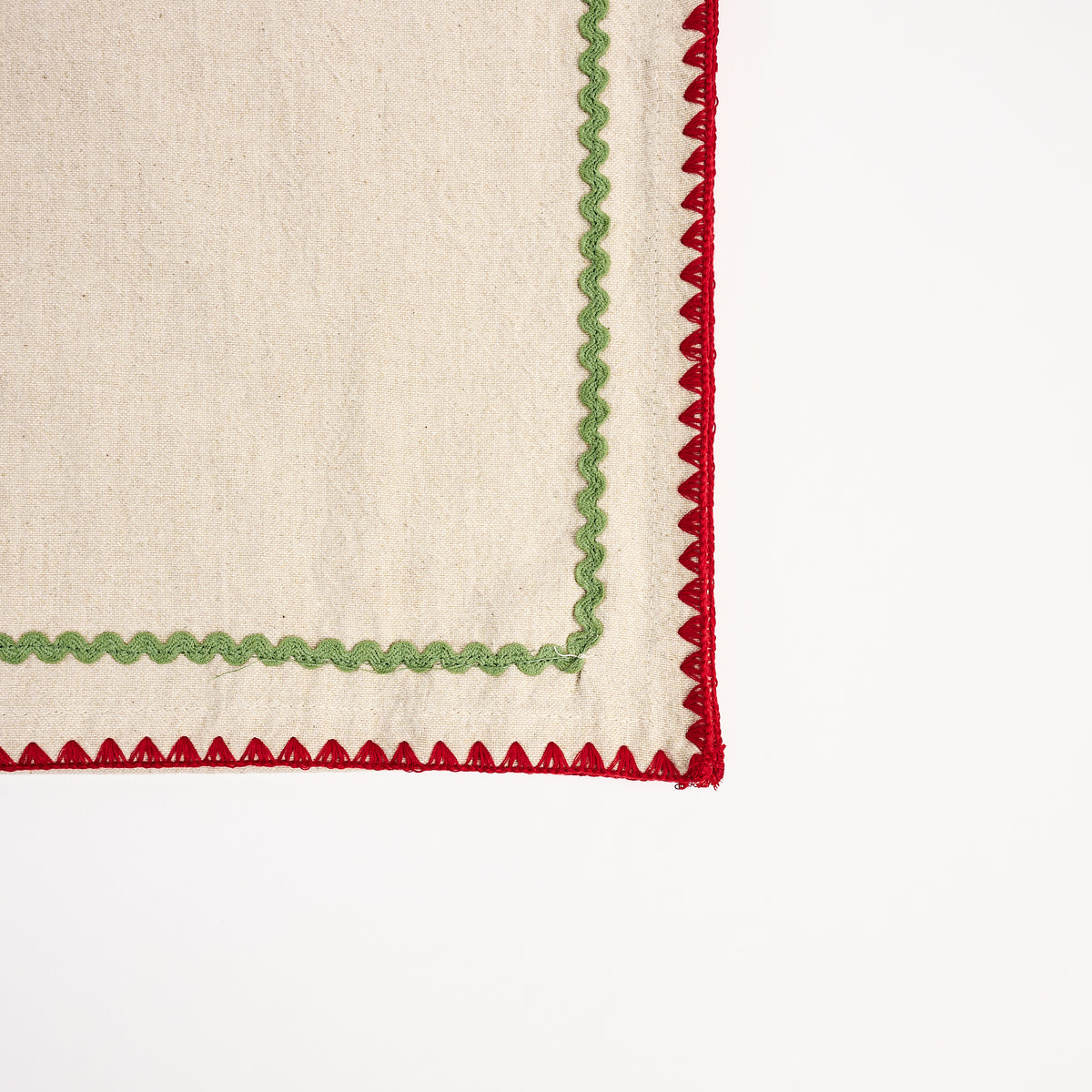 Holiday Ric Rac Trim Table Runner on a white background at Addison West