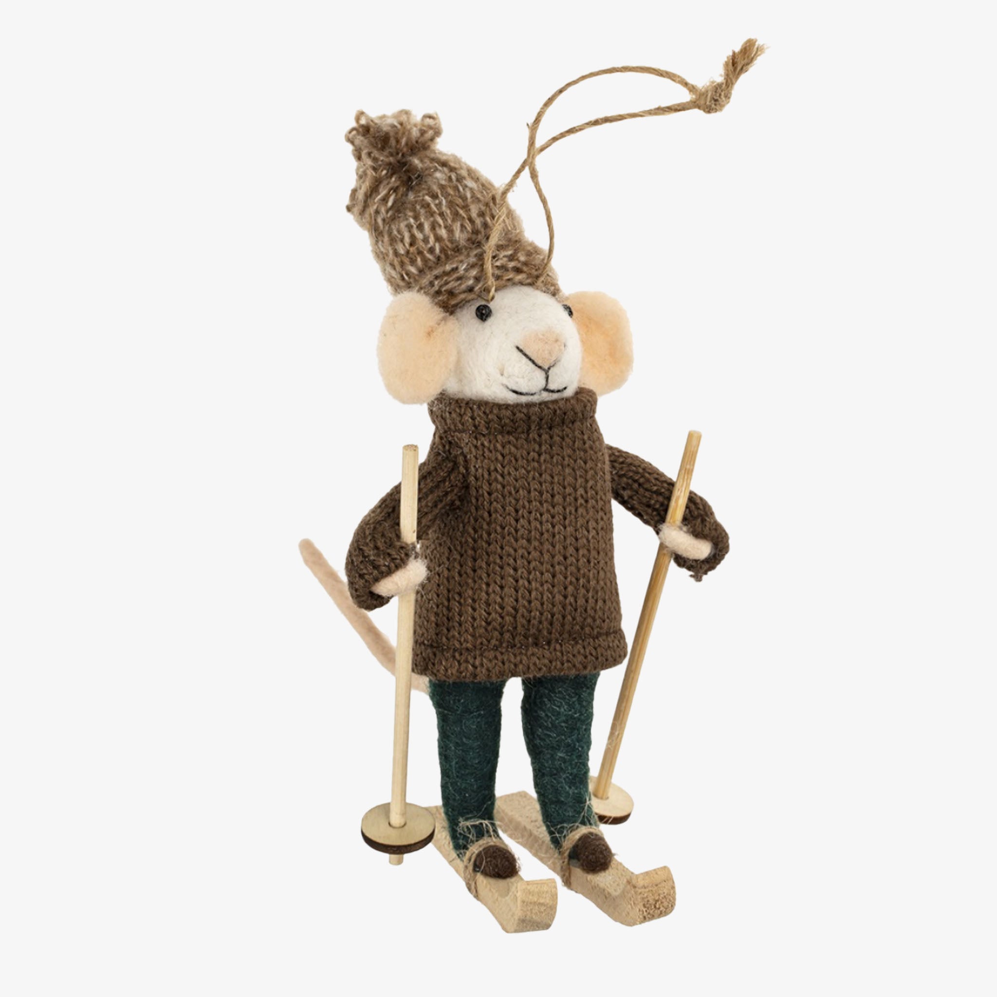 Stuffed animal toy resembling a mouse in winter clothing with skis and ski poles on a white background