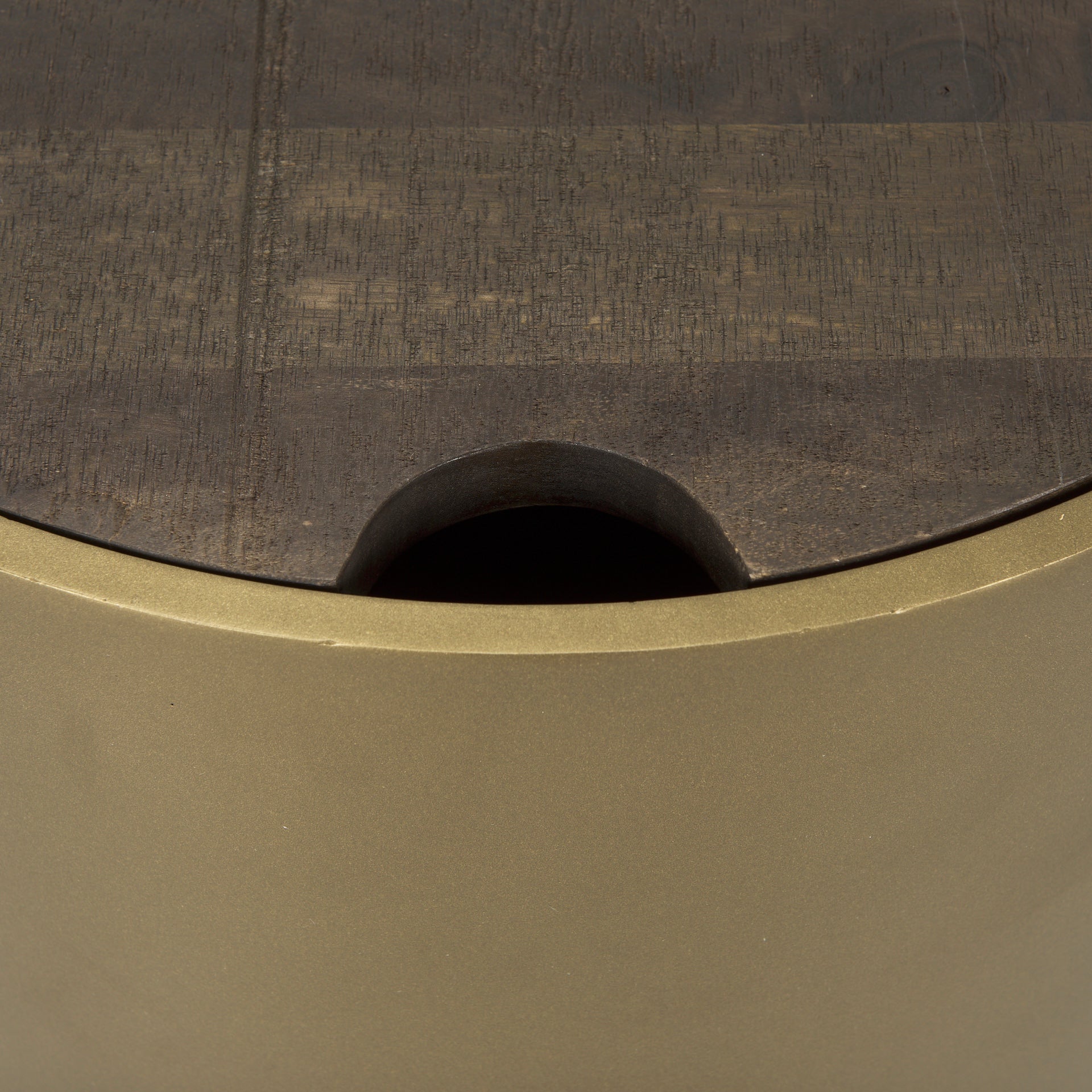 Close up of Eclipse Gold Metal Drum Base with Dark Brown Wood Top End/Side Table