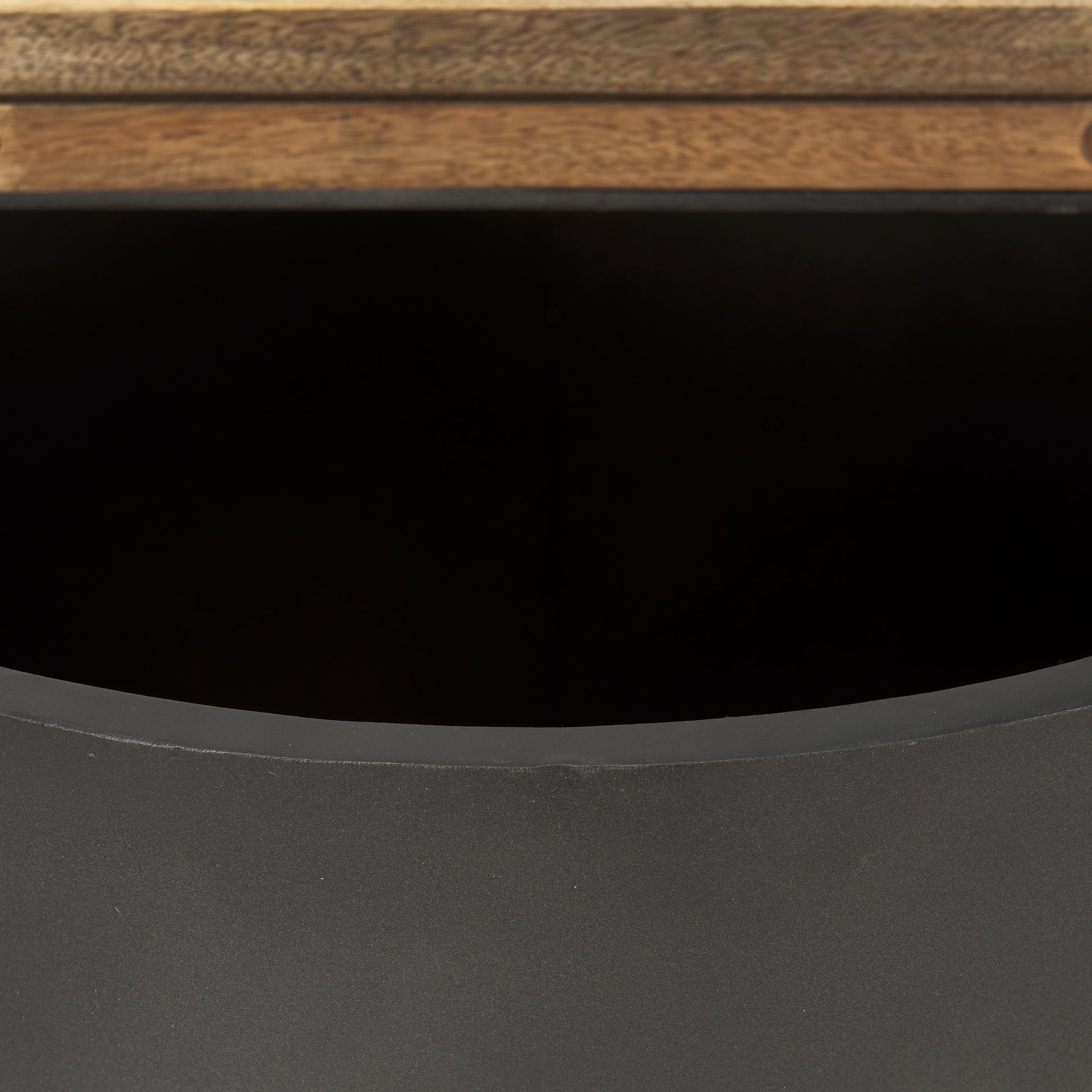 Close up of Eclipse Gunmetal Gray metal iron Drum Base with mango Wood Top storage open End Side Table