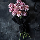 Abigail Ahern Faux Carnation in Blush on a grey background at Addison West