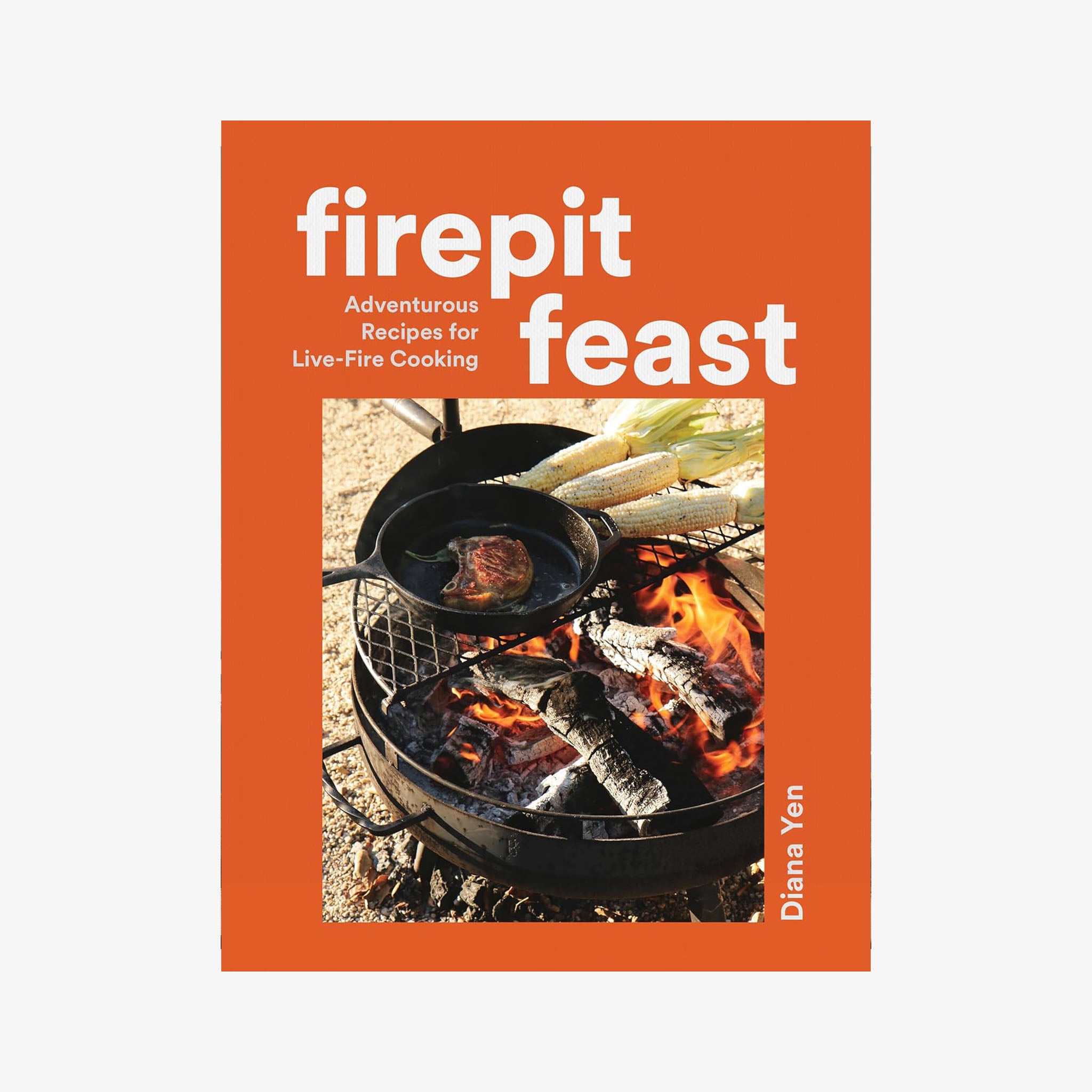 Front cover of cookbook Firepit Feast with image of a fire and grill grate on a white background