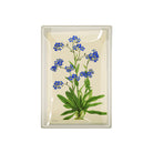 Decoupage glass tray with Forget Me Nots on a white background