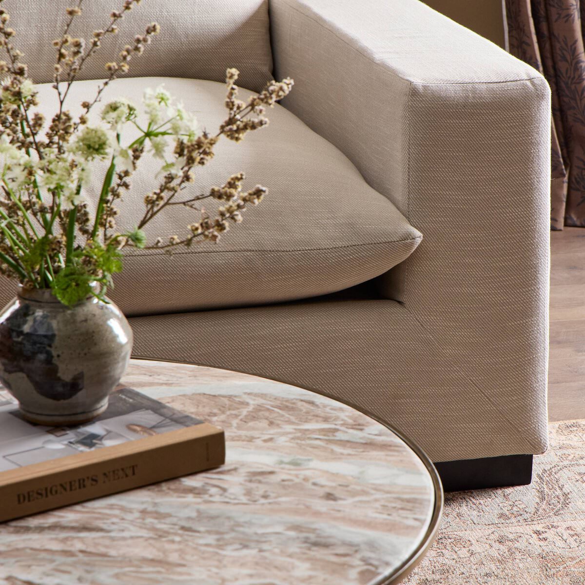 Close up of Four Hands 74" Grant Sofa in Ashby Oatmeal in a living room at Addison West