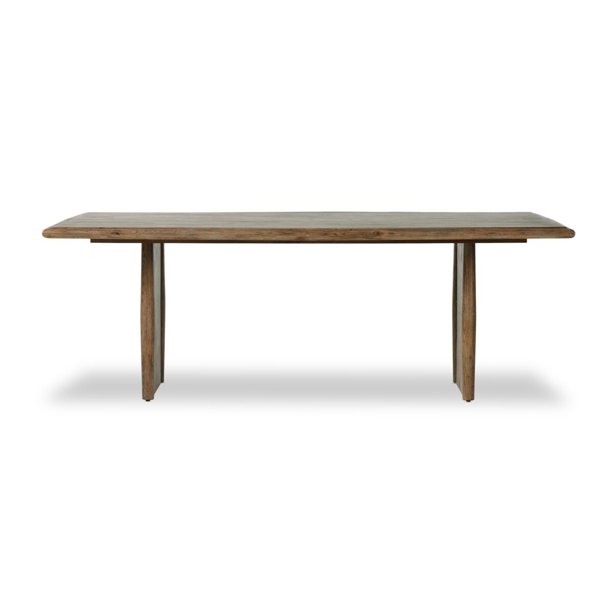 Four Hands 85.5" Glenview Dining Table in Weathered Oak Veneer on a white background at Addison West