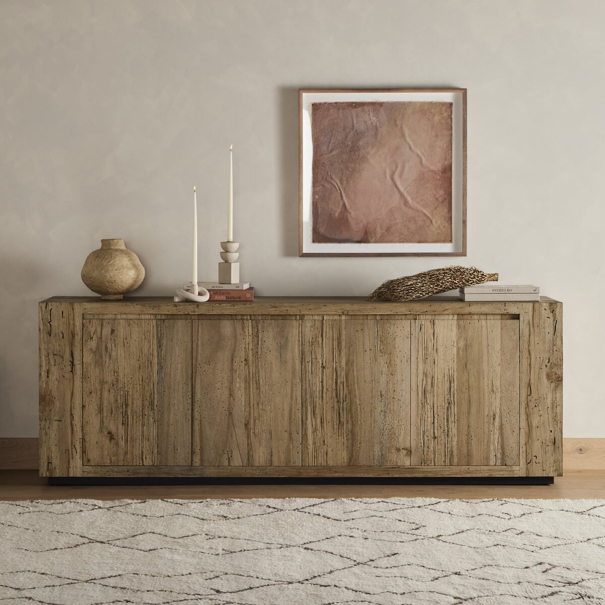 Four Hands Abaso Sideboard in Rustic Wormwood Oak in a living room at Addison West