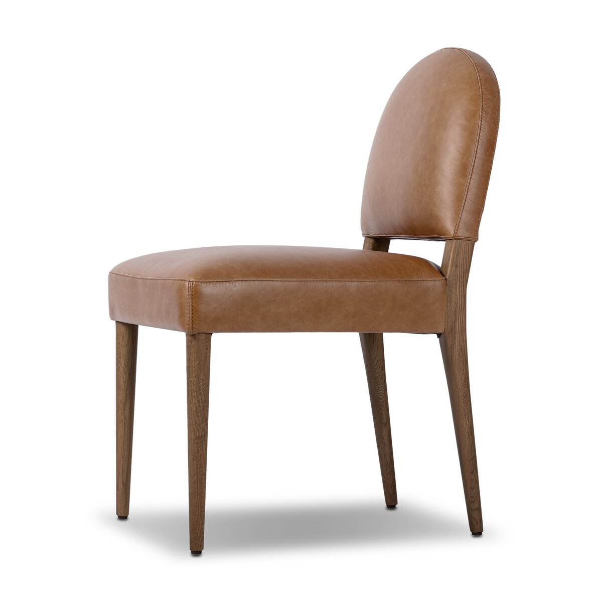 Four Hands Abilene Dining Chair in Chaps Saddle on a white background at Addison West