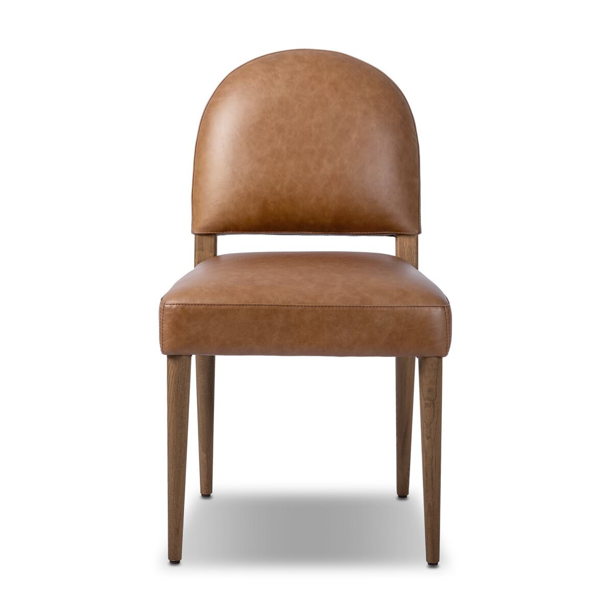 Four Hands Abilene Dining Chair in Chaps Saddle on a white background at Addison West