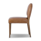 Four Hands Abilene Dining Chair in Chaps Saddle on a white background at Addison West