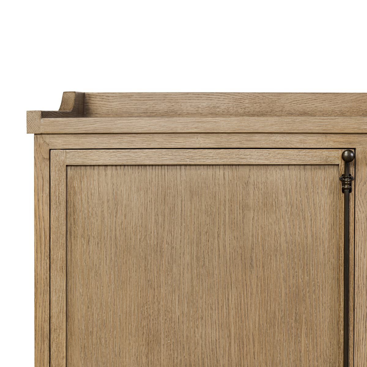 Close up of Four Hands Adley Sideboard in Weathered Washed Oak Veneer on a white background at Addison West