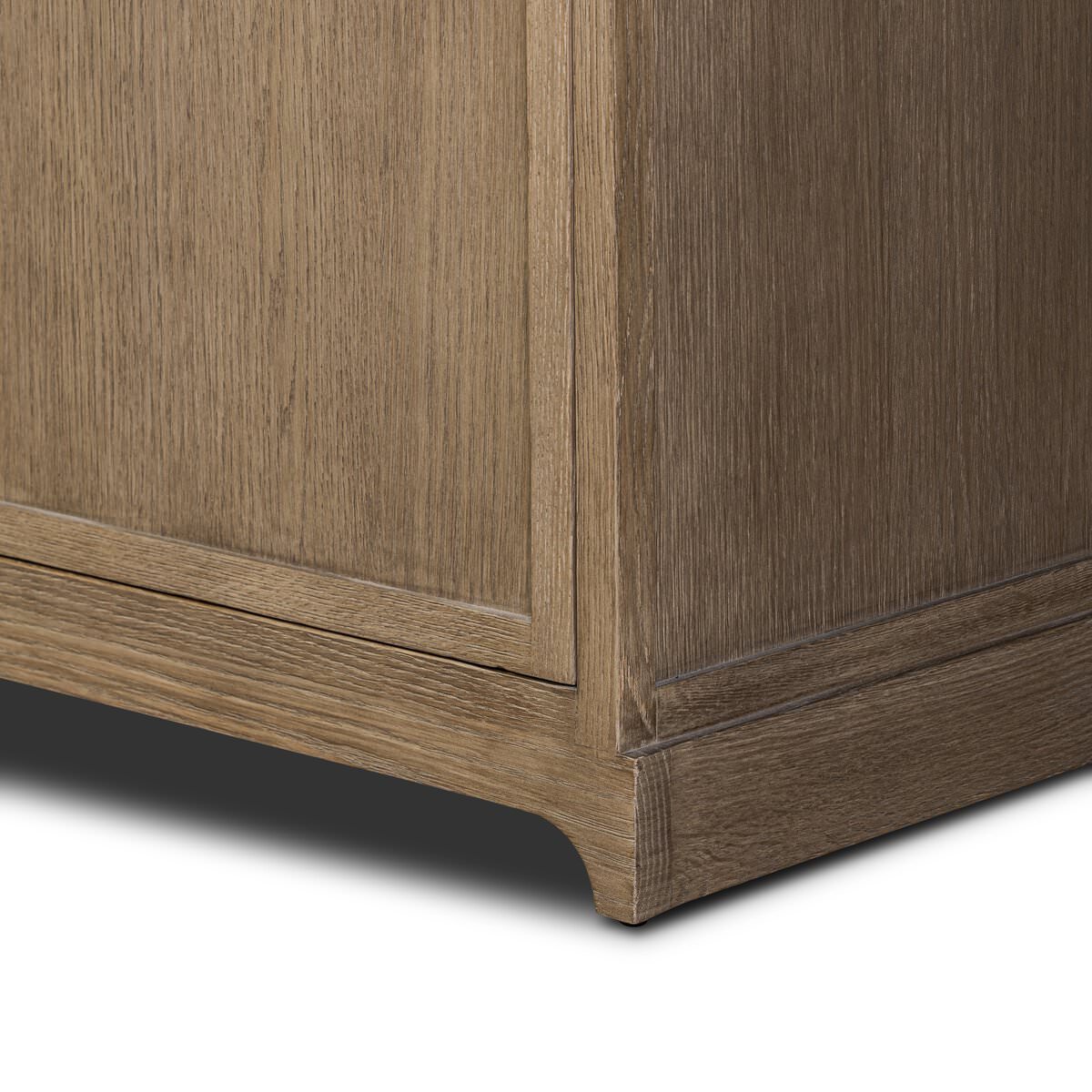 Close up of Four Hands Adley Sideboard in Weathered Washed Oak Veneer on a white background at Addison West