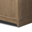Close up of Four Hands Adley Sideboard in Weathered Washed Oak Veneer on a white background at Addison West