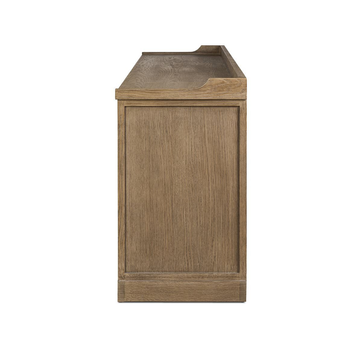 Side of Four Hands Adley Sideboard in Weathered Washed Oak Veneer on a white background at Addison West