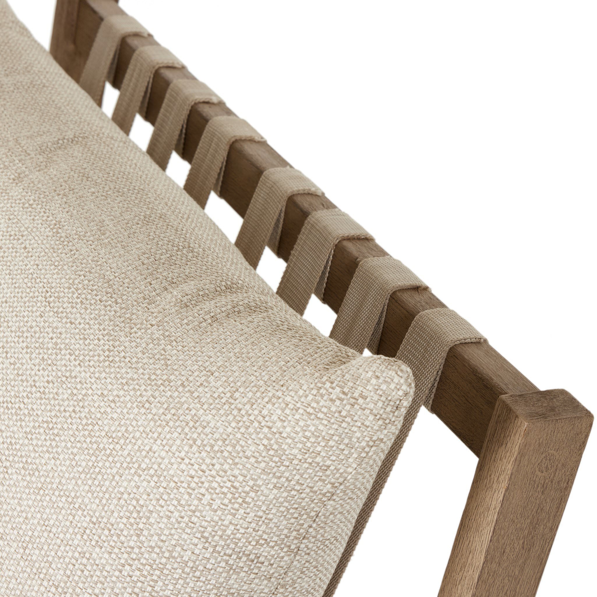 Close up of Four Hands Aiken Outdoor Rocking Chair in Faye Sand on a white background at Addison West