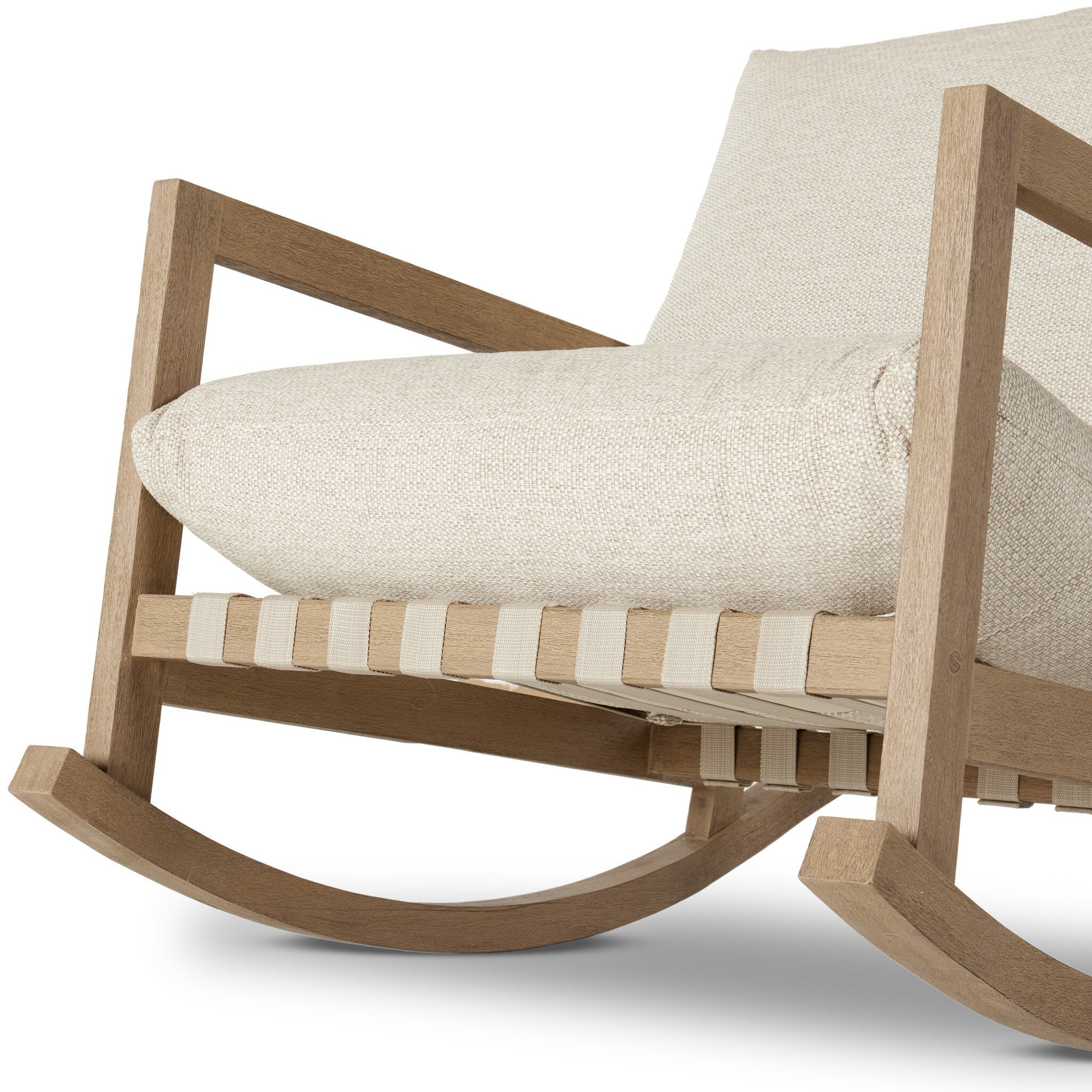 Close up of Four Hands Aiken Outdoor Rocking Chair in Faye Sand on a white background at Addison West