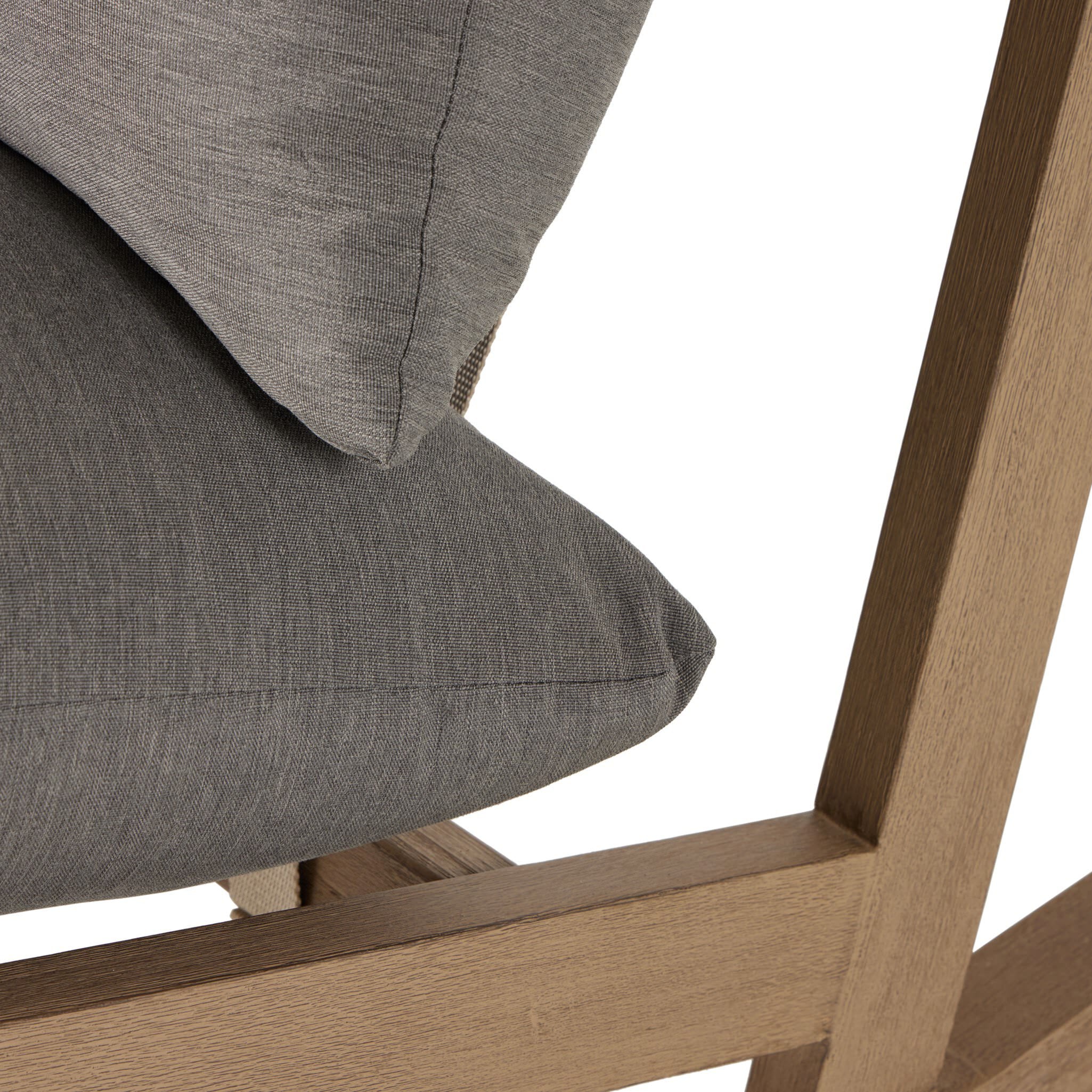 Close up of Four Hands Aiken Outdoor Rocking Chair in Venao Charcoal on a white background at Addison West