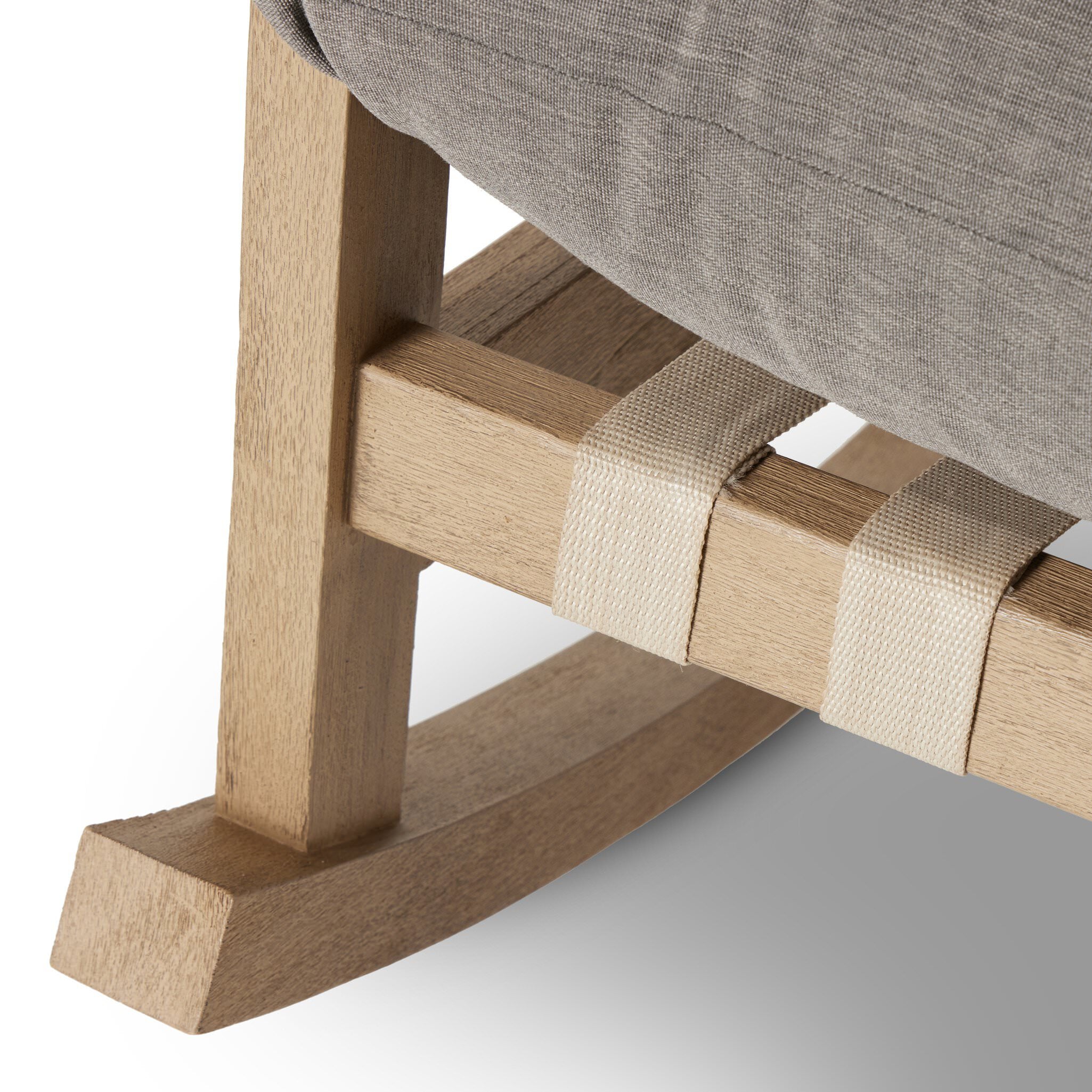 Close up of Four Hands Aiken Outdoor Rocking Chair in Venao Charcoal on a white background at Addison West