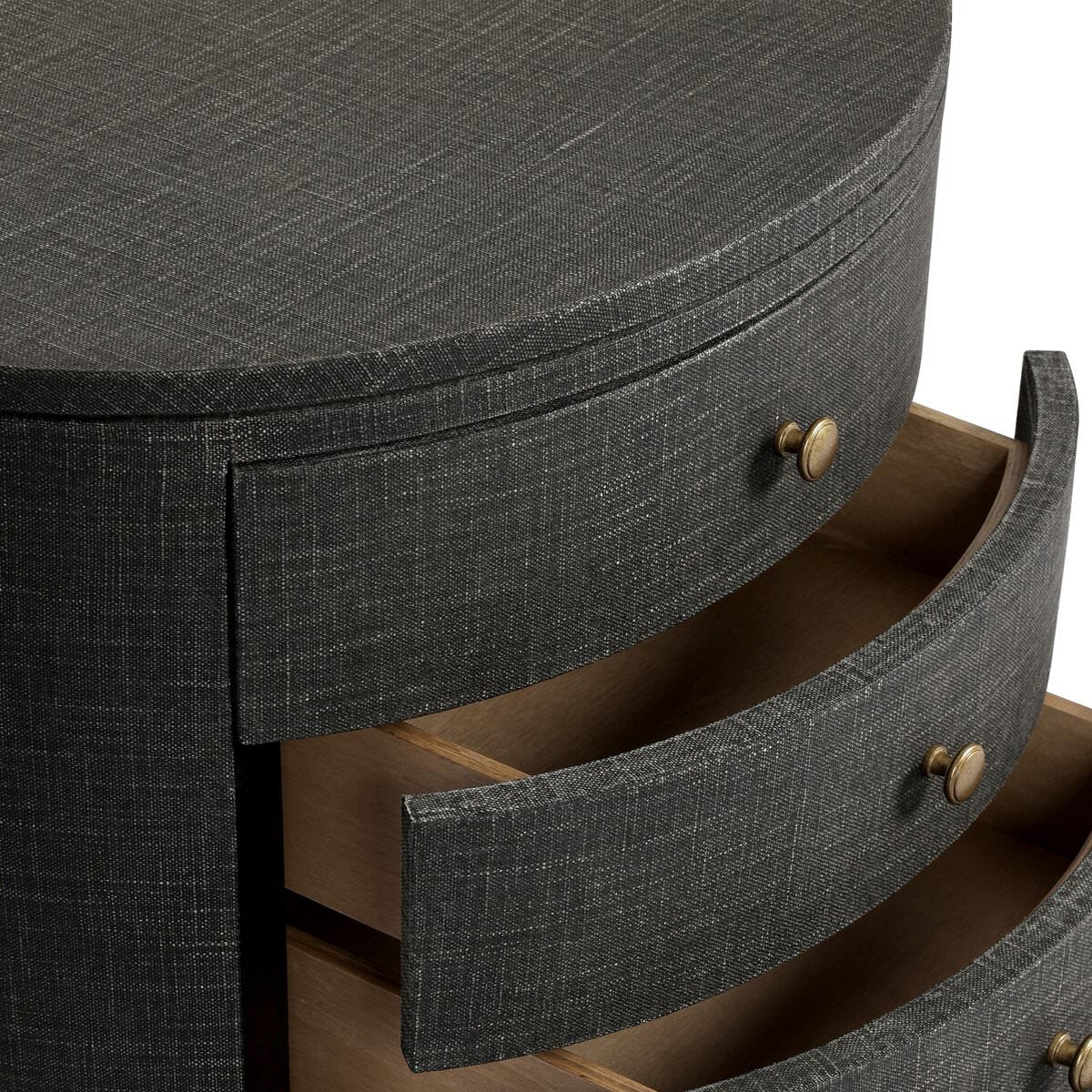 Close up of Four Hands Amelia Oval Nightstand in Black Linen on a white background at Addison West