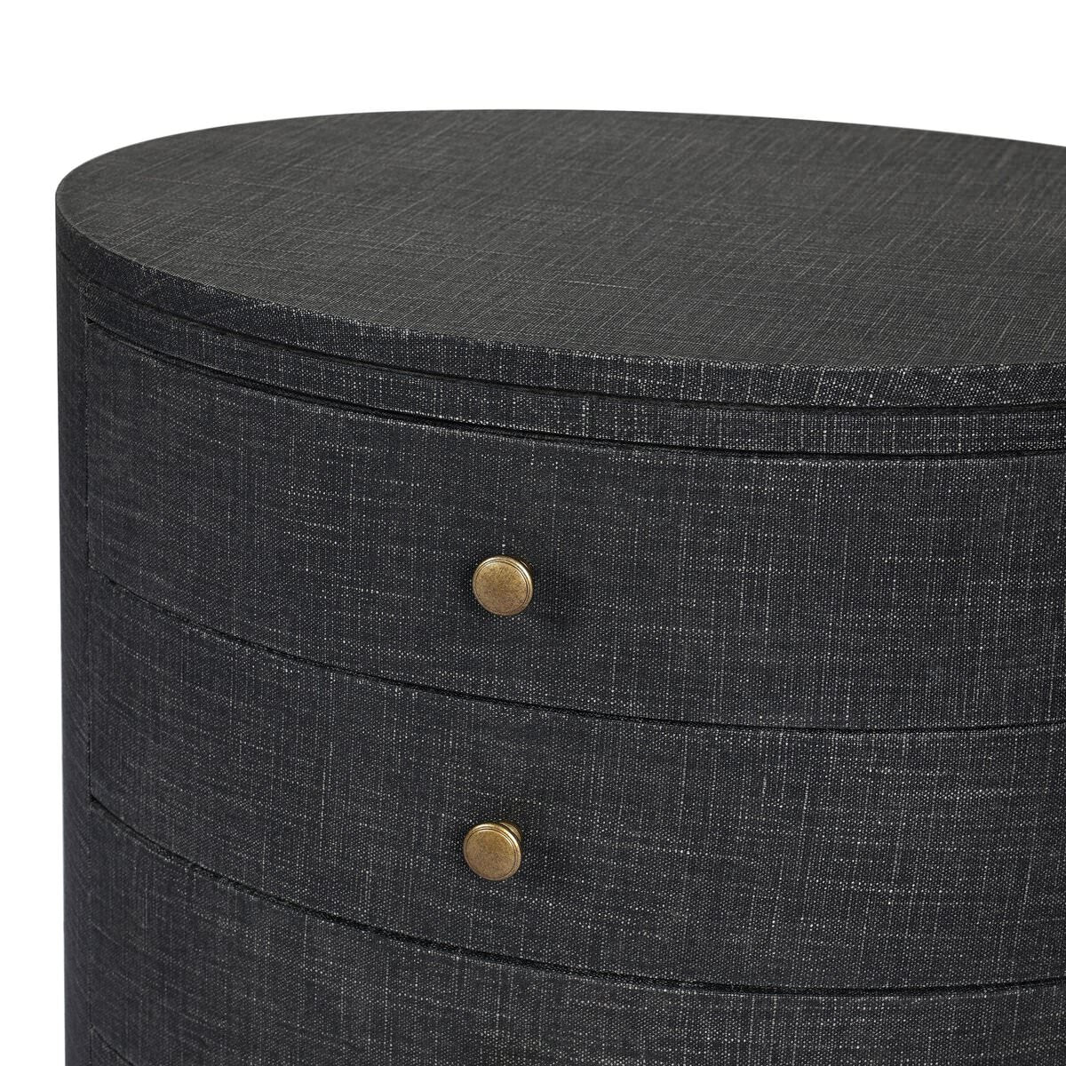 Close up of Four Hands Amelia Oval Nightstand in Black Linen on a white background at Addison West