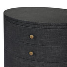 Close up of Four Hands Amelia Oval Nightstand in Black Linen on a white background at Addison West