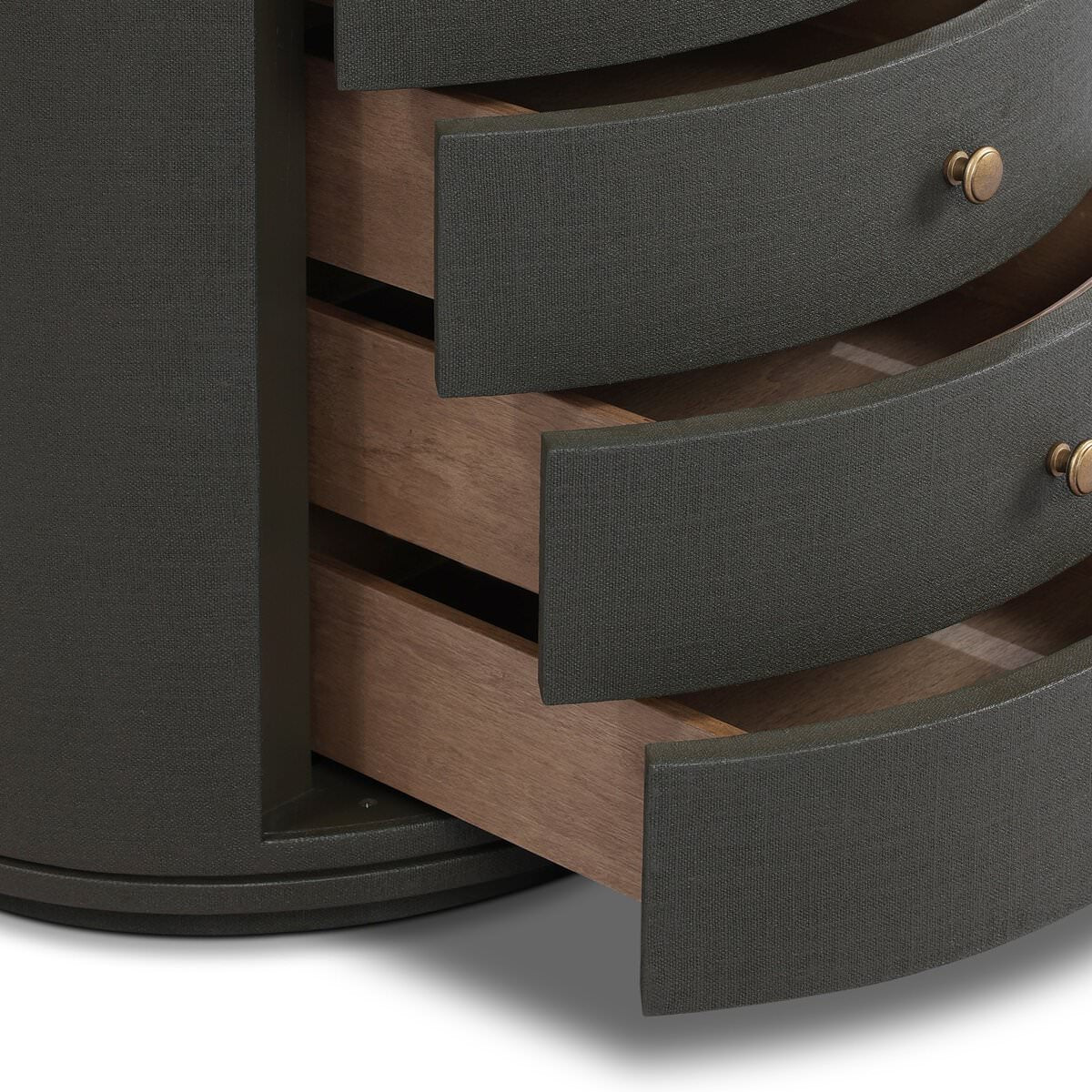 Close up of Four Hands Amelia Oval Nightstand in Dark Green Lacquered Linen on a white background at Addison West