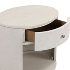 Close up of Four Hands Amelia Oval One Drawer Nightstand in Ivory Painted Linen on a white background at Addison West