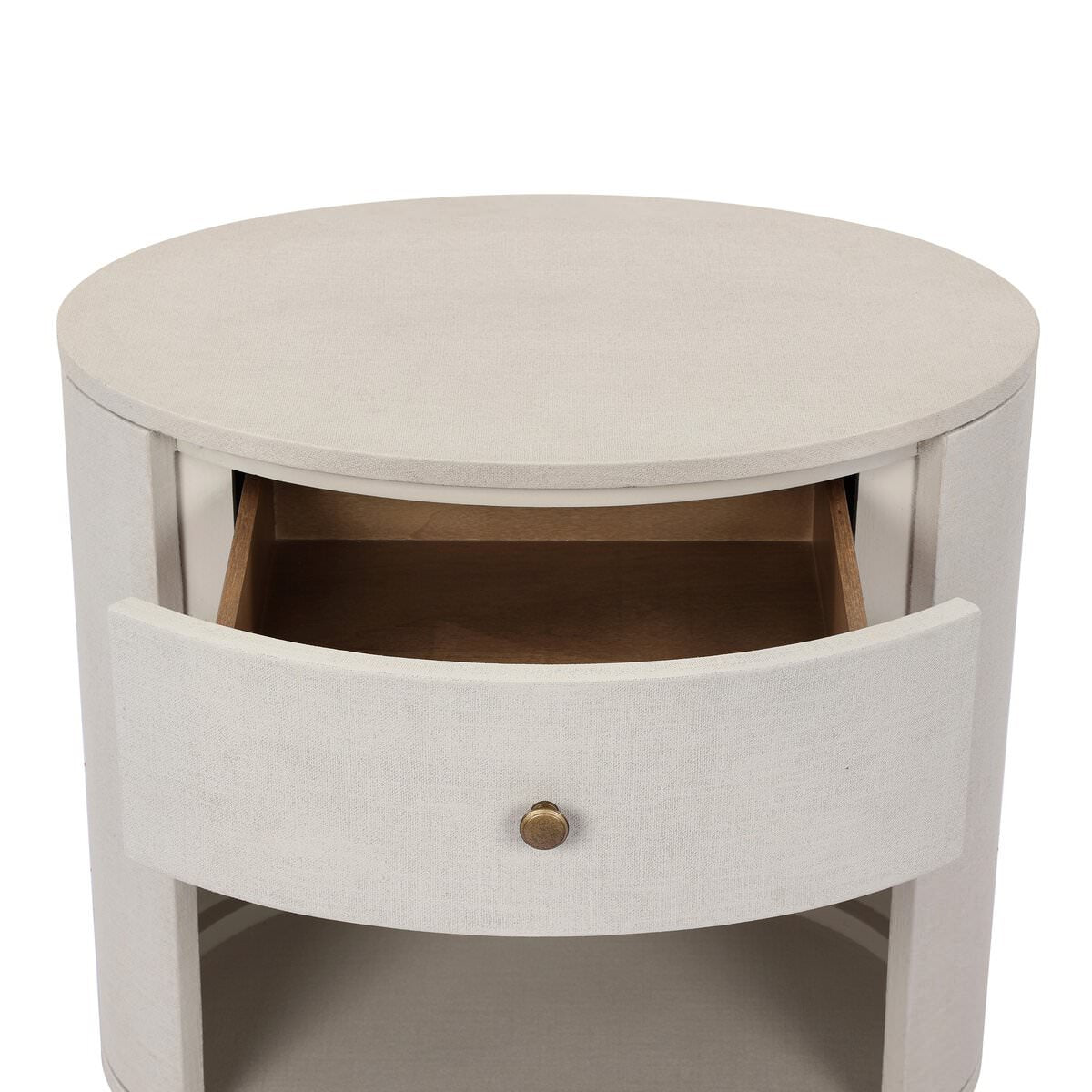 Close up of Four Hands Amelia Oval One Drawer Nightstand in Ivory Painted Linen on a white background at Addison West