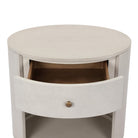 Close up of Four Hands Amelia Oval One Drawer Nightstand in Ivory Painted Linen on a white background at Addison West