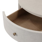 Close up of Four Hands Amelia Oval One Drawer Nightstand in Ivory Painted Linen on a white background at Addison West