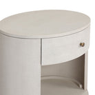 Close up of Four Hands Amelia Oval One Drawer Nightstand in Ivory Painted Linen on a white background at Addison West