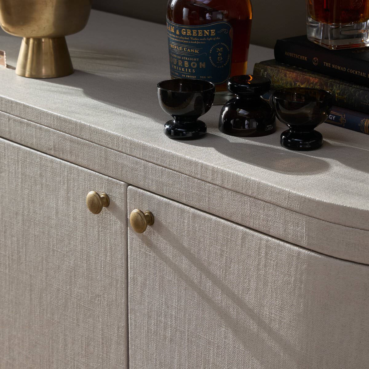 Close up of Four Hands Amelia Sideboard in Ivory Painted Linen on a white background at Addison West