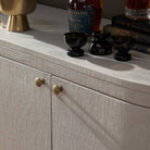 Close up of Four Hands Amelia Sideboard in Ivory Painted Linen on a white background at Addison West