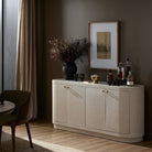 Four Hands Amelia Sideboard in Ivory Painted Linen in a dark green dining room at Addison West