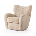Four Hands Amelie Chair in Beige Shearling on a white background at Addison West