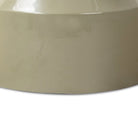 Close up of Four Hands Ara End Table in Moss Lacquered Concrete on a white background