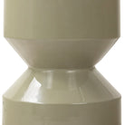 Close up of Four Hands Ara End Table in Moss Lacquered Concrete on a white background