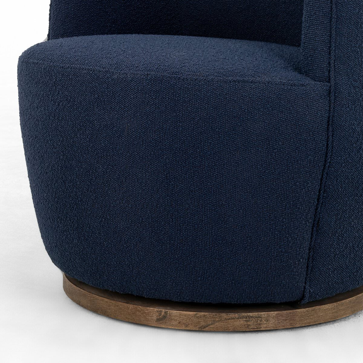 Close up of Four Hands Aurora Swivel Chair in Copenhagen Indigo on a white background at Addison West