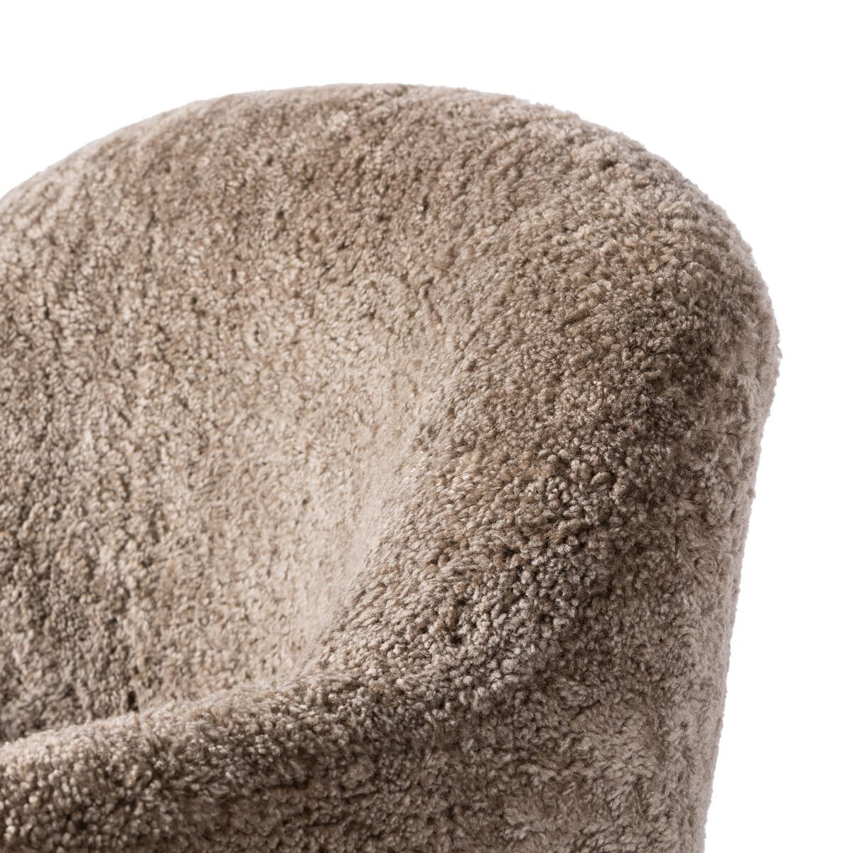 Close up of Four Hands Aurora Swivel Chair in Taupe Shearling on a white background at Addison West