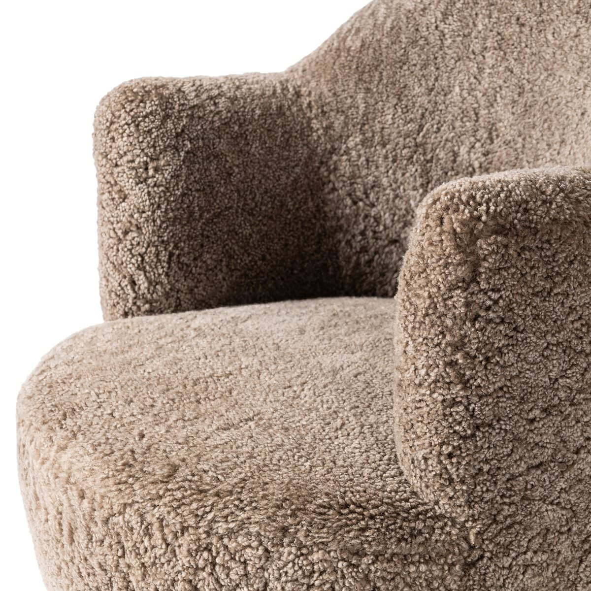 Close up of Four Hands Aurora Swivel Chair in Taupe Shearling on a white background at Addison West
