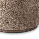 Close up of Four Hands Aurora Swivel Chair in Taupe Shearling on a white background at Addison West