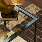 Close up of Four Hands Babylon Small End Table in Hammered Gunmetal in a living room at Addison West