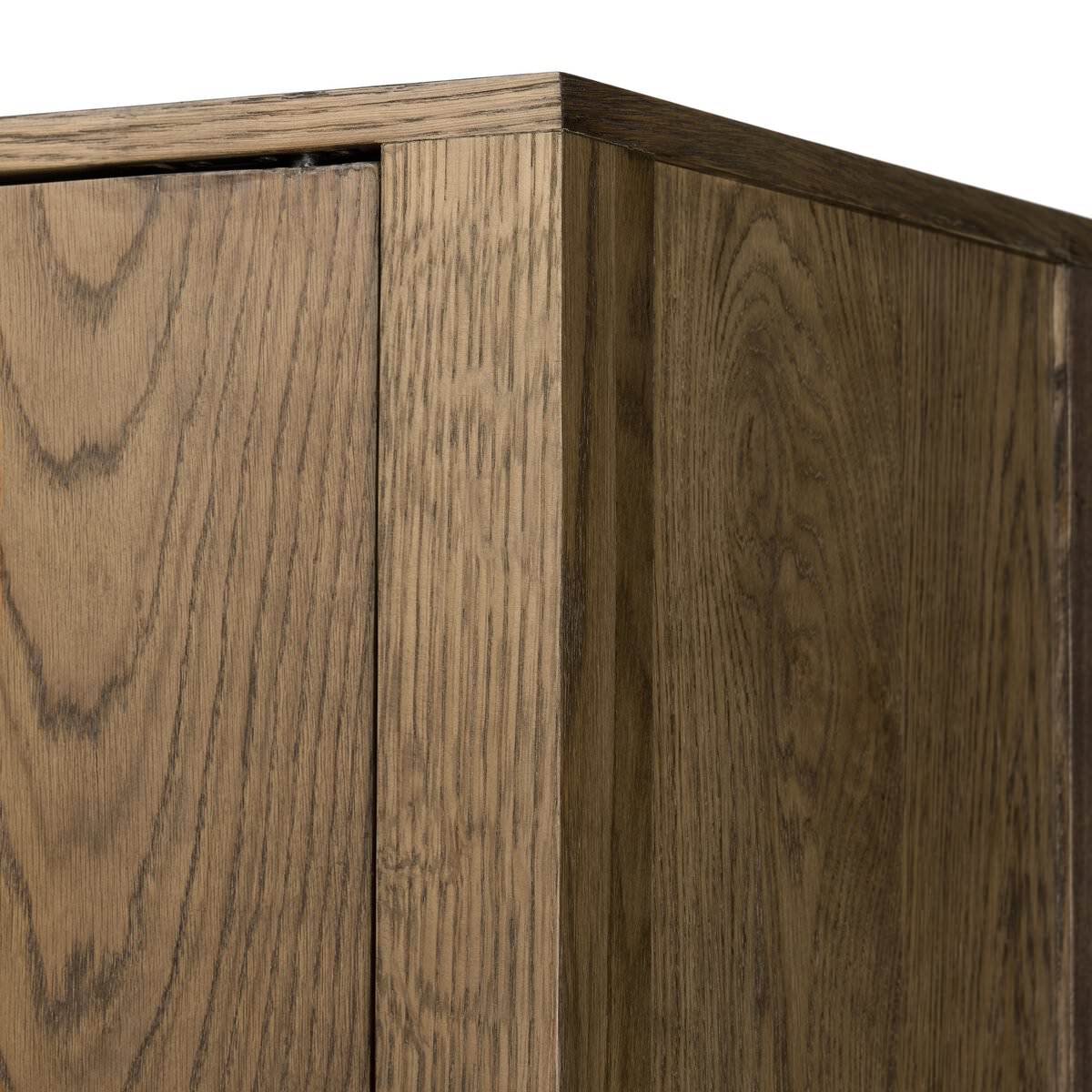 Close up of Four Hands Bedford Cabinet in Warm Natural Oak Veneer on a white background at Addison West