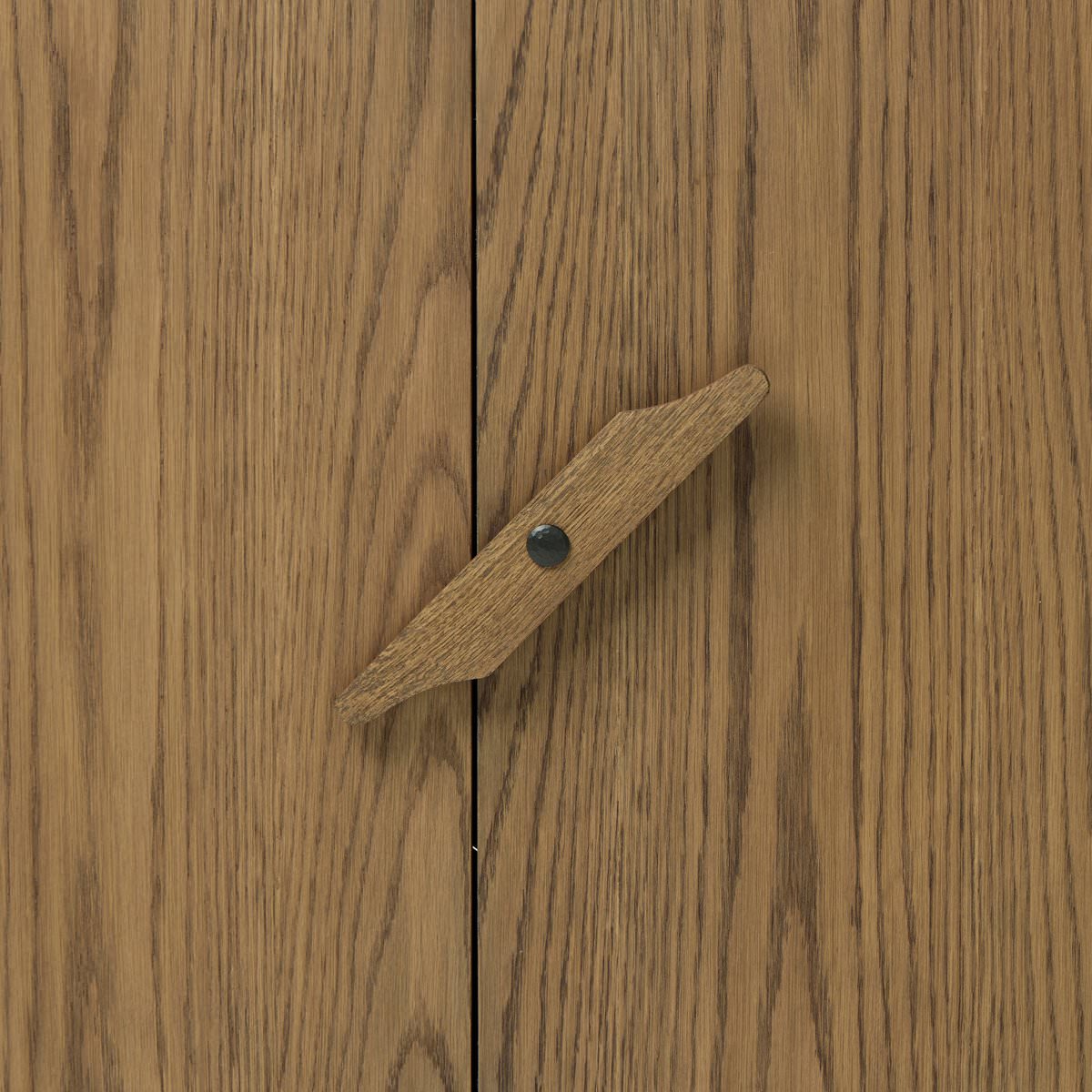 Close up of Four Hands Bedford Cabinet in Warm Natural Oak Veneer on a white background at Addison West